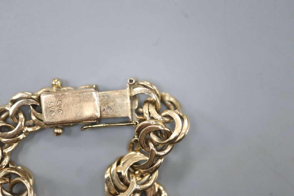 A yellow metal double link bracelet (tests as 9ct gold), 16.5 grams.